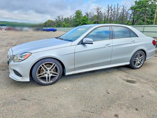 62974366 :رقم المزاد ، WDDHF8JB9EB071599 vin ، 2014 Mercedes-benz E مزاد بيع