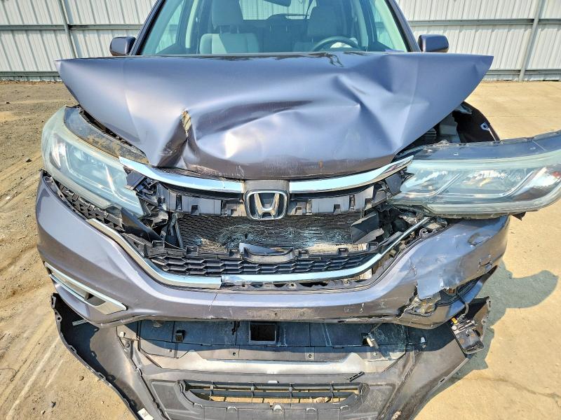 62399776 :رقم المزاد ، 2HKRM4H54FH706001 vin ، 2015 Honda Cr-v مزاد بيع