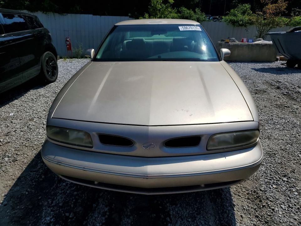 1999 Oldsmobile 88 მანქანა იყიდება აუქციონზე, vin: 1G3HN52K3X4825033, აუქციონის ნომერი: 59670136