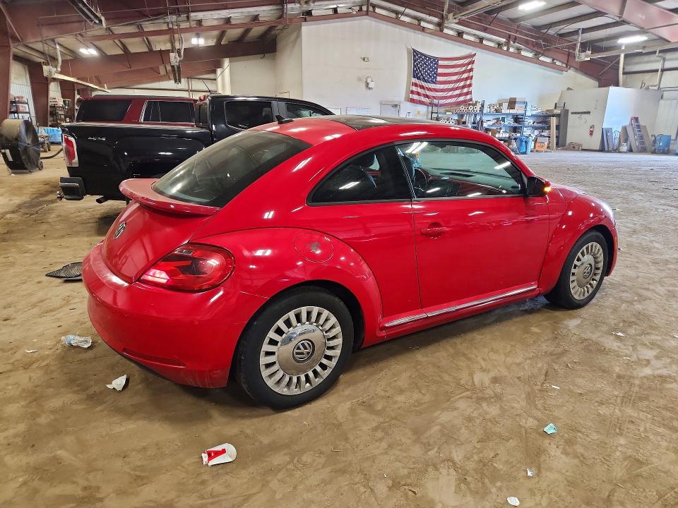 63038886 :رقم المزاد ، 3VWJX7AT5EM631295 vin ، 2014 Volkswagen Beetle مزاد بيع