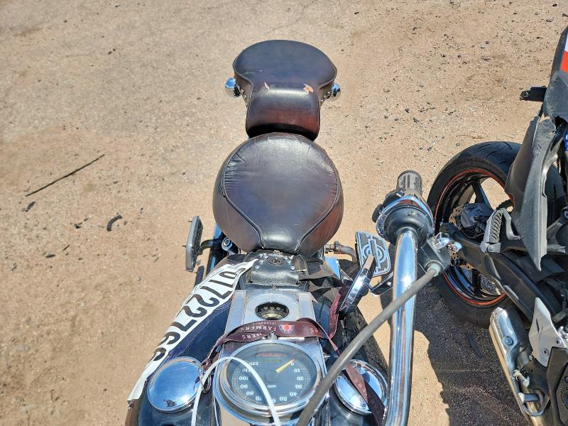 61722766 :رقم المزاد ، 1HD1BJL48XY041442 vin ، 1999 Harley-davidson Flstc مزاد بيع