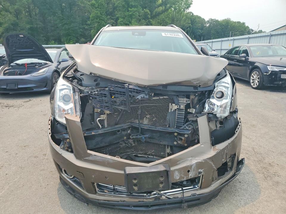 2014 Cadillac Srx მანქანა იყიდება აუქციონზე, vin: 3GYFNBE35ES590233, აუქციონის ნომერი: 61165686
