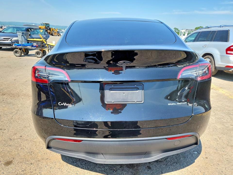 60387616 :رقم المزاد ، 7SAYGDEE4PA029393 vin ، 2023 Tesla Model Y مزاد بيع