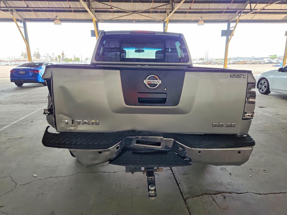 62002726 :رقم المزاد ، 1N6AA0ED7AN313464 vin ، 2010 Nissan Titan مزاد بيع