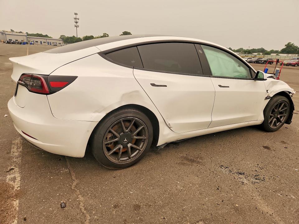 Продажа на аукционе авто 2021 Tesla Model 3, vin: 5YJ3E1EA4MF915950, номер лота: 61413226