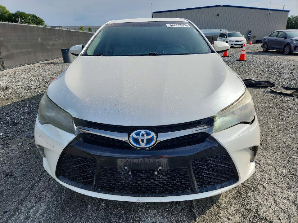 Auction sale of the 2016 Toyota Camry Hybrid, vin: 4T1BD1FK0GU180400, lot number: 66063976