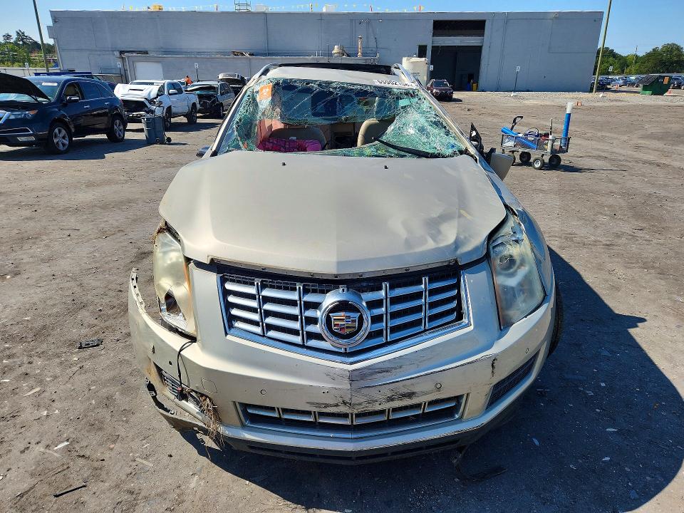 2015 Cadillac Srx მანქანა იყიდება აუქციონზე, vin: 3GYFNBE31FS641812, აუქციონის ნომერი: 65902106