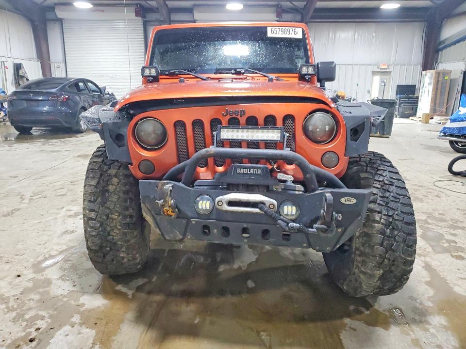 Auction sale of the 2009 Jeep Wrangler Unlimited, vin: 1J4GA691X9L761649, lot number: 65798976