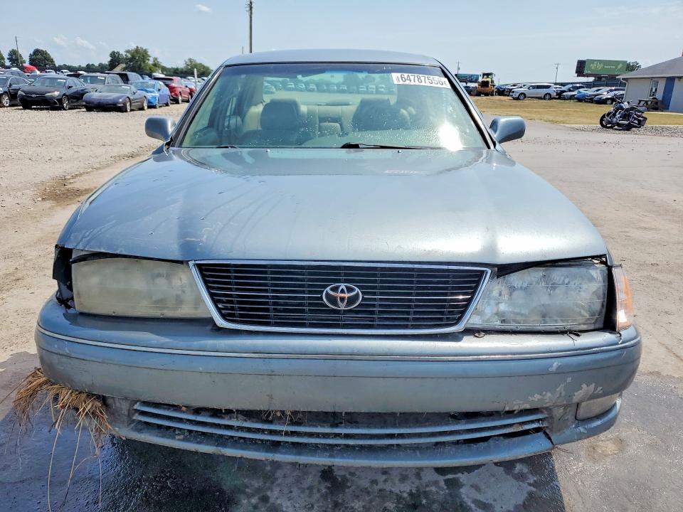 64787556 :رقم المزاد ، 4T1BF18B6XU332039 vin ، 1999 Toyota Avalon مزاد بيع