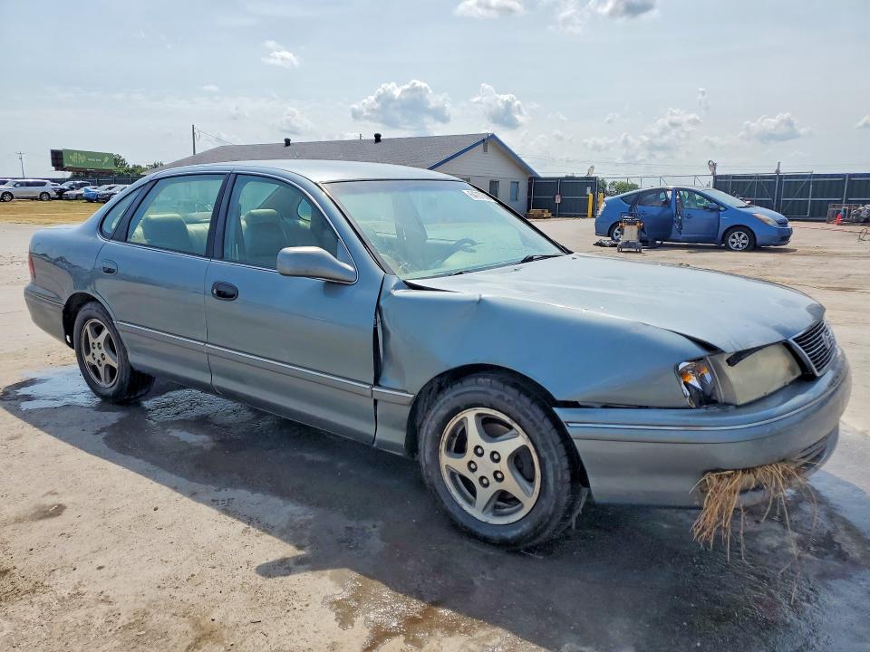 64787556 :رقم المزاد ، 4T1BF18B6XU332039 vin ، 1999 Toyota Avalon مزاد بيع