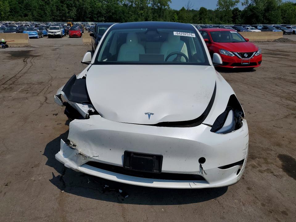 Auction sale of the 2025 Tesla Model Y, vin: 7SAYGAEE7SF288311, lot number: 64292576