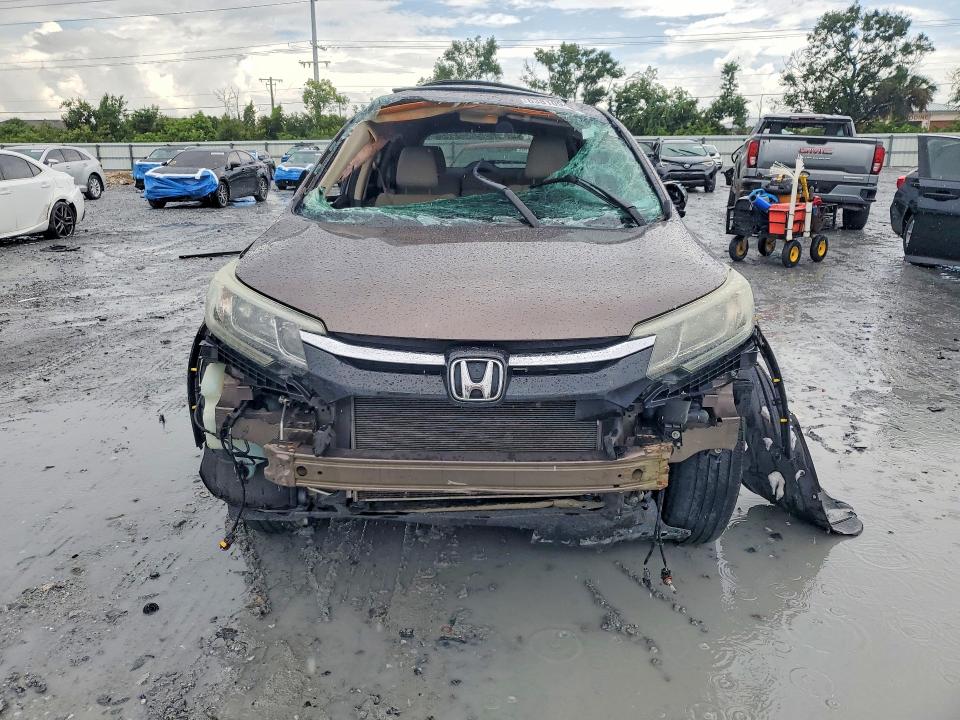 63810946 :رقم المزاد ، 2HKRM3H54FH503247 vin ، 2015 Honda Cr-v مزاد بيع