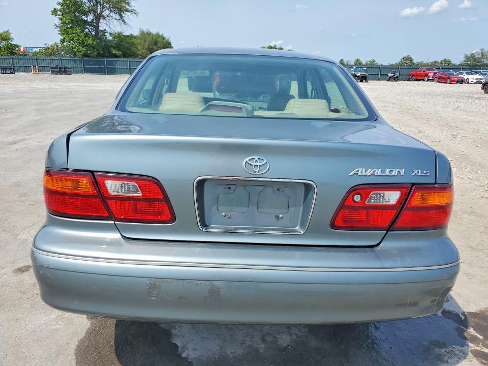 64787556 :رقم المزاد ، 4T1BF18B6XU332039 vin ، 1999 Toyota Avalon مزاد بيع