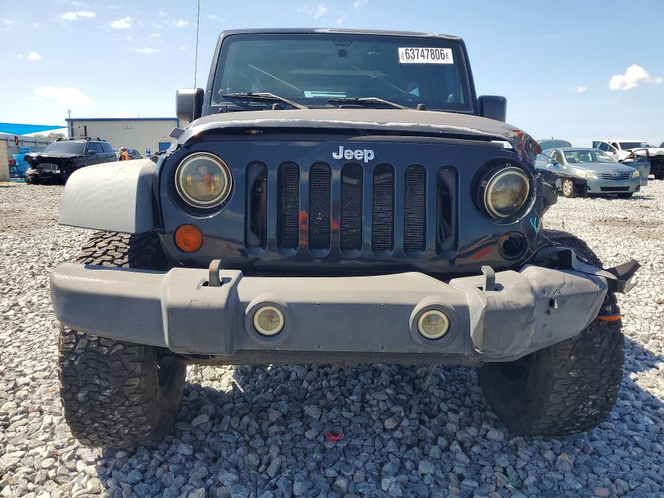 2011 Jeep Wrangler Unlimited მანქანა იყიდება აუქციონზე, vin: 1J4BA3H15BL591720, აუქციონის ნომერი: 63747806