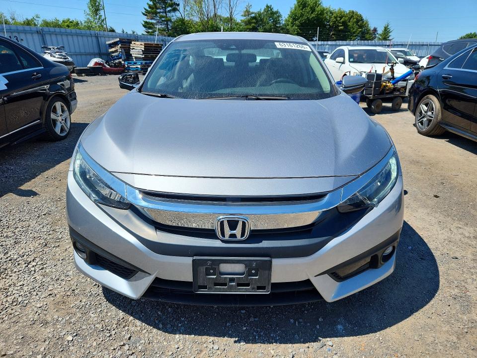 63161266 :رقم المزاد ، 2HGFC1F90JH102751 vin ، 2018 Honda Civic مزاد بيع