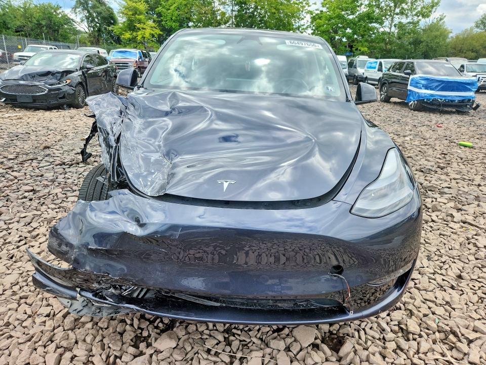 2025 Tesla Model Y მანქანა იყიდება აუქციონზე, vin: 7SAYGDEE9SA339760, აუქციონის ნომერი: 66497656