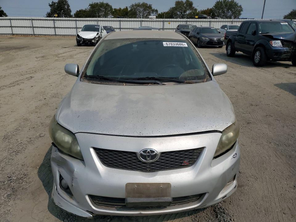 67033686 :رقم المزاد ، 1NXBU40E59Z124010 vin ، 2009 Toyota Corolla مزاد بيع