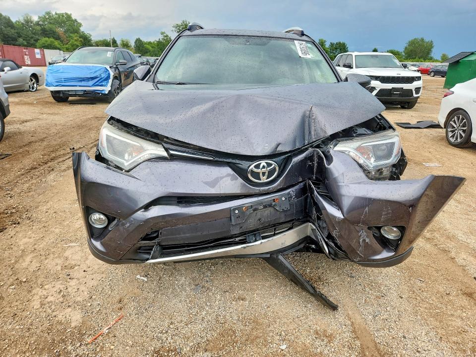 Продажа на аукционе авто 2016 Toyota Rav4, vin: JTMRFREV4GJ096301, номер лота: 64793896
