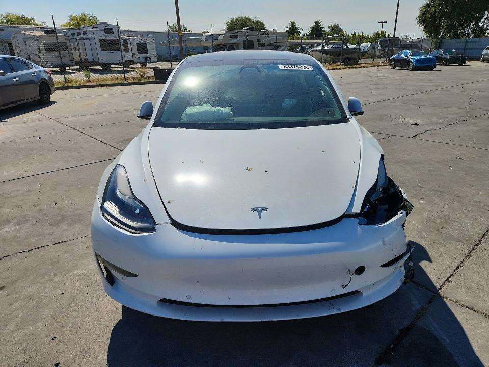 Продажа на аукционе авто 2021 Tesla Model 3, vin: 5YJ3E1EA1MF078686, номер лота: 63376296