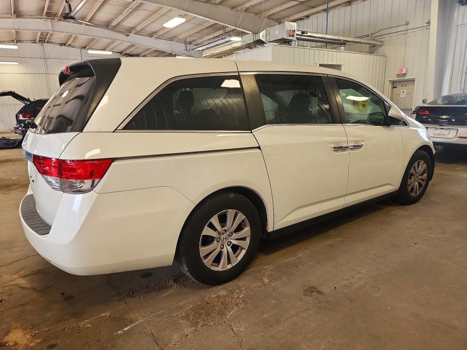 63904356 :رقم المزاد ، 5FNRL5H65EB026364 vin ، 2014 Honda Odyssey مزاد بيع