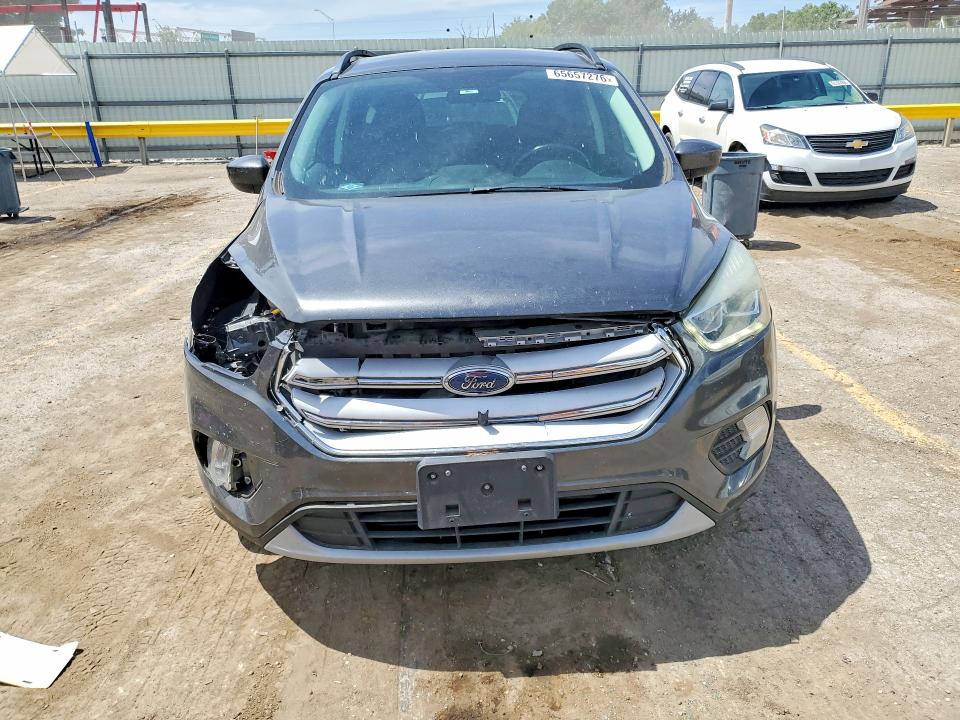 Продаж на аукціоні авто 2018 Ford Escape, vin: 1FMCU0HD5JUA71709, номер лоту: 65657276