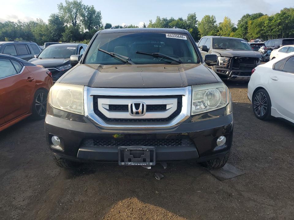 66335646 :رقم المزاد ، 5FNYF4H49BB013947 vin ، 2011 Honda Pilot مزاد بيع