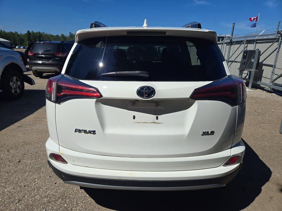 Auction sale of the 2018 Toyota Rav4, vin: 2T3WFREV3JW411519, lot number: 65610206