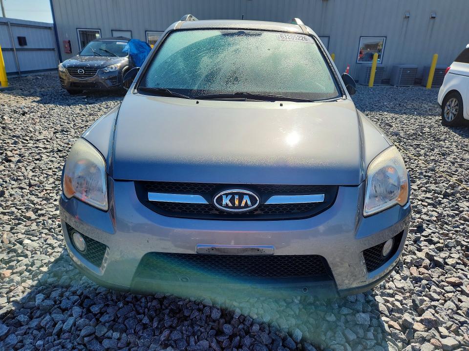 63205226 :رقم المزاد ، KNDJE723897654450 vin ، 2009 Kia Sportage مزاد بيع