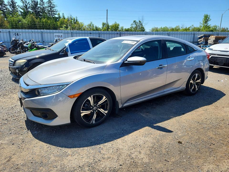 63161266 :رقم المزاد ، 2HGFC1F90JH102751 vin ، 2018 Honda Civic مزاد بيع