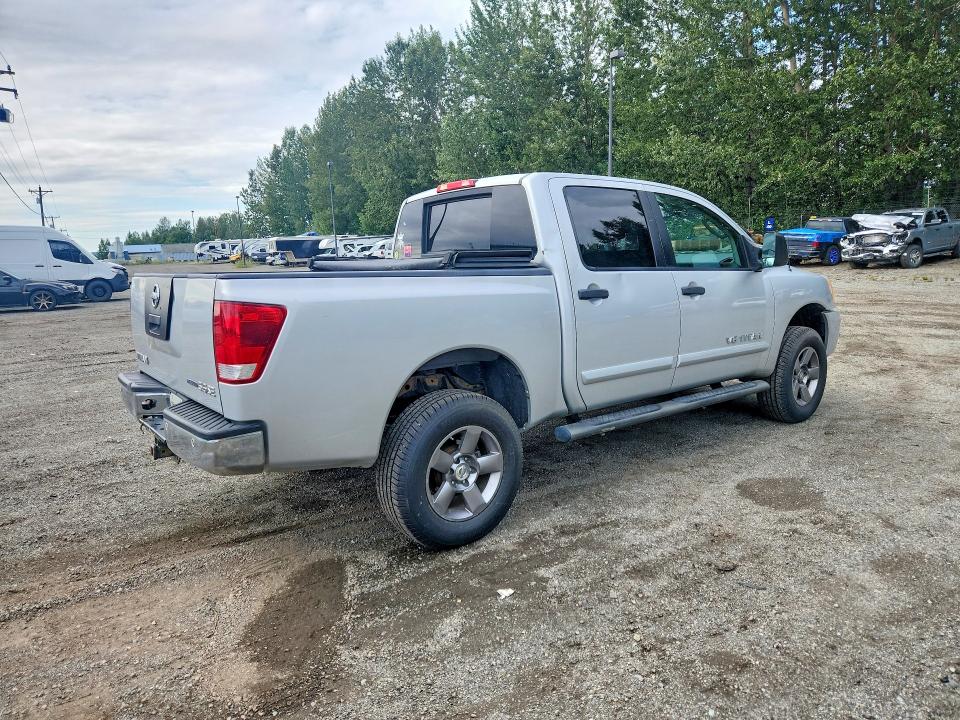 64476076 :رقم المزاد ، 1N6BA0EC5AN314477 vin ، 2010 Nissan Titan مزاد بيع