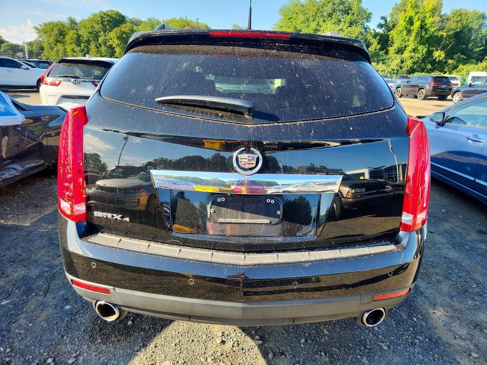 Auction sale of the 2011 Cadillac Srx, vin: 3GYFNDEY3BS612961, lot number: 65304676