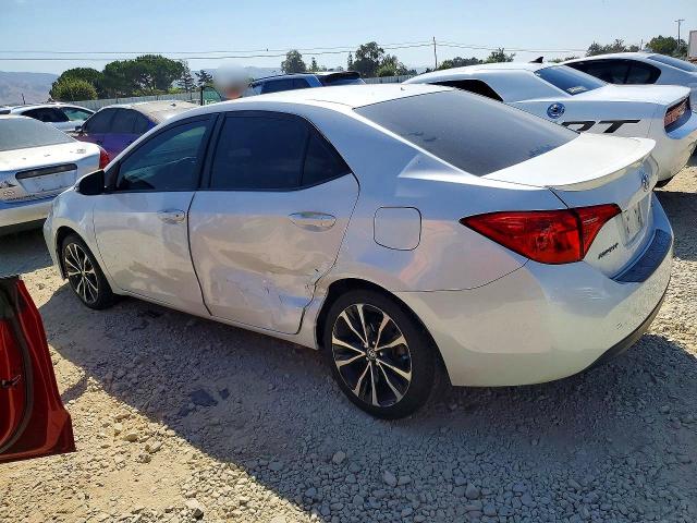 64080986 :رقم المزاد ، 5YFBURHE9JP770478 vin ، 2018 Toyota Corolla مزاد بيع