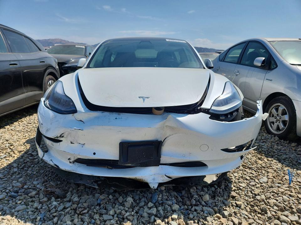 Продажа на аукционе авто 2021 Tesla Model 3, vin: 5YJ3E1EA9MF998050, номер лота: 64857576