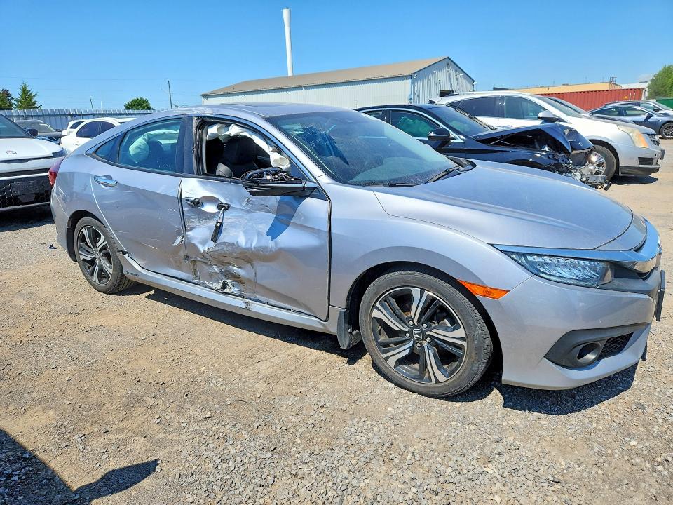 63161266 :رقم المزاد ، 2HGFC1F90JH102751 vin ، 2018 Honda Civic مزاد بيع