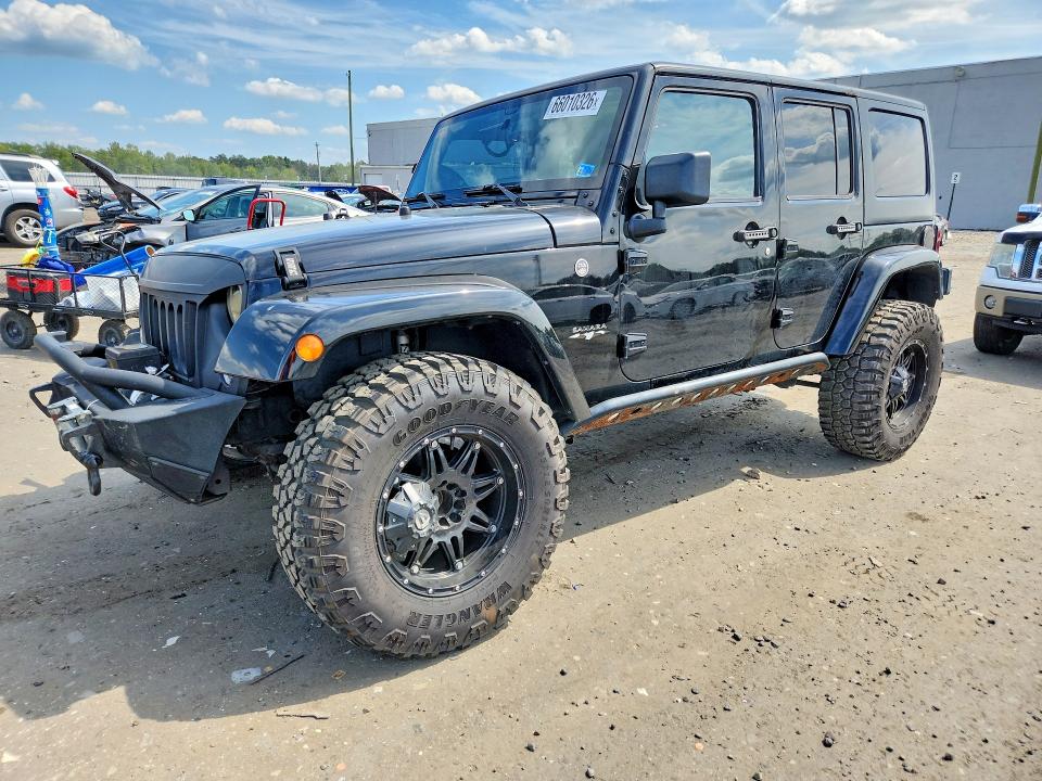 Auction sale of the 2016 Jeep Wrangler Unlimited, vin: 1C4BJWEG3GL292203, lot number: 66010326
