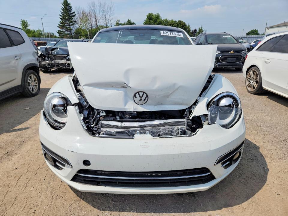 63578306 :رقم المزاد ، 3VWJD7AT7KM707071 vin ، 2019 Volkswagen Beetle مزاد بيع