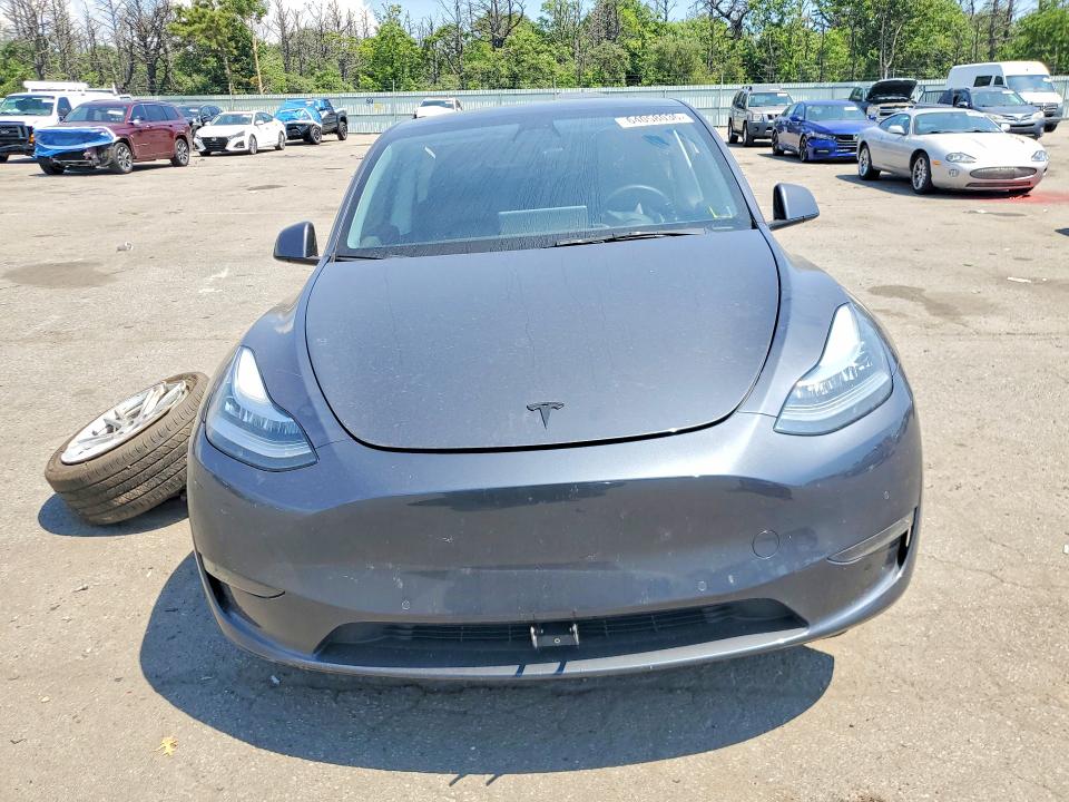 64058036 :رقم المزاد ، 5YJYGDEEXMF203821 vin ، 2021 Tesla Model Y مزاد بيع