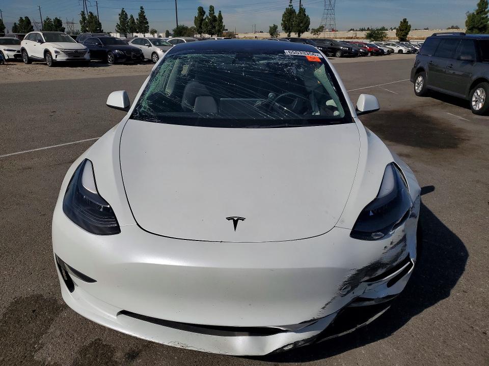 Продажа на аукционе авто 2023 Tesla Model 3, vin: 5YJ3E1EA1PF412462, номер лота: 65533356
