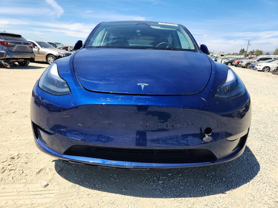 65761316 :رقم المزاد ، 7SAYGDED7PF976566 vin ، 2023 Tesla Model Y مزاد بيع