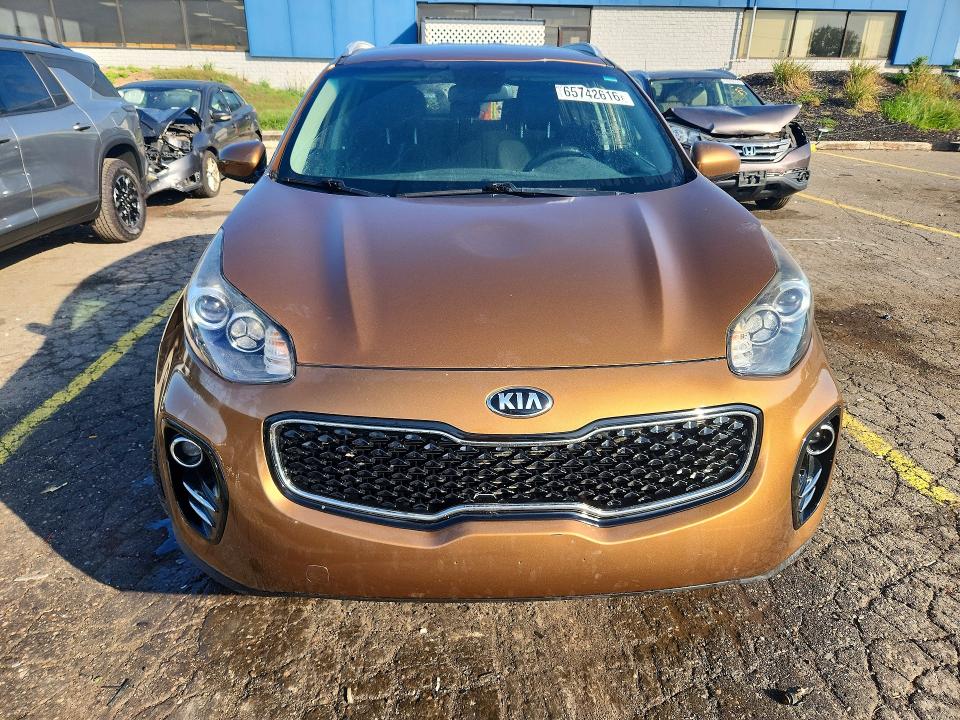 65742616 :رقم المزاد ، KNDPMCAC6J7406709 vin ، 2018 Kia Sportage مزاد بيع