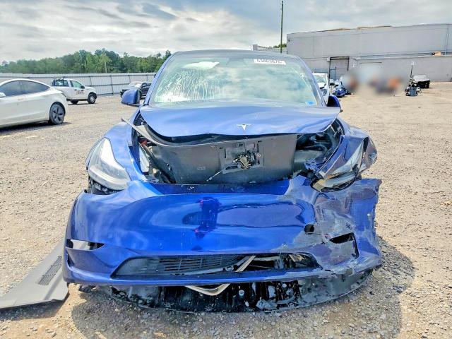 63863076 :رقم المزاد ، 5YJYGDEE5MF065914 vin ، 2021 Tesla Model Y مزاد بيع