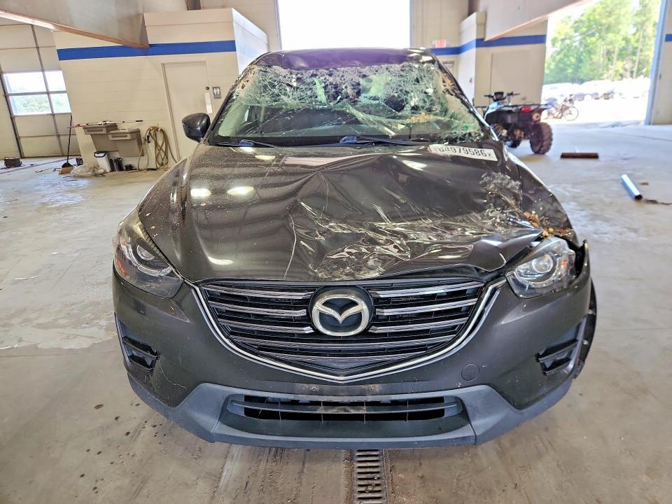 64979586 :رقم المزاد ، JM3KE2DY1G0630214 vin ، 2016 Mazda Cx-5 مزاد بيع