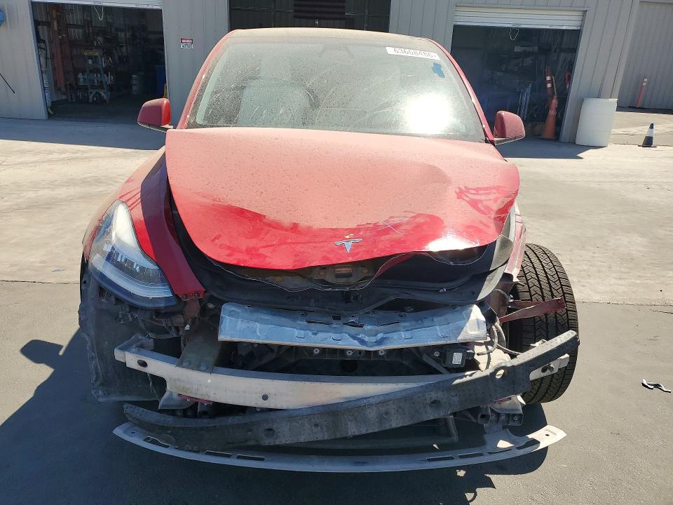 63668486 :رقم المزاد ، 5YJYGDEE5MF298000 vin ، 2021 Tesla Model Y مزاد بيع
