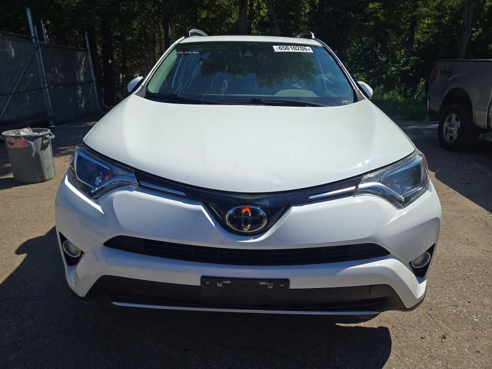 Auction sale of the 2018 Toyota Rav4, vin: 2T3WFREV3JW411519, lot number: 65610206