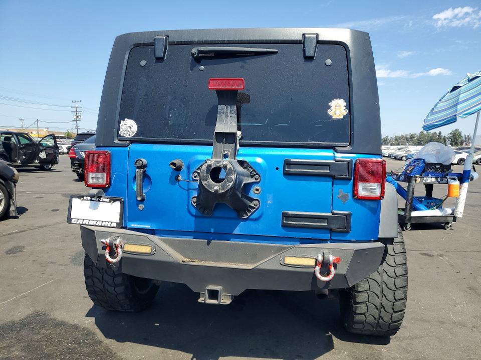 64309976 :رقم المزاد ، 1C4BJWDG9FL570506 vin ، 2015 Jeep Wrangler Unlimited مزاد بيع