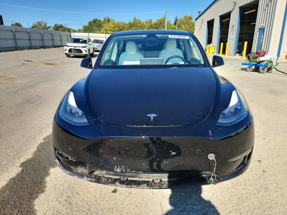 64290066 :رقم المزاد ، 7SAYGAEE4PF640560 vin ، 2023 Tesla Model Y مزاد بيع