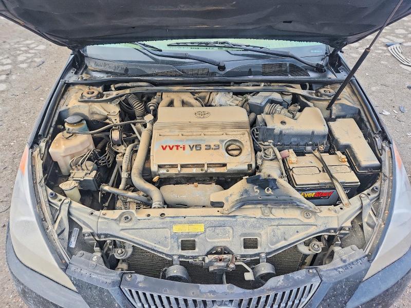 65702976 :رقم المزاد ، 4T1CA38P14U008499 vin ، 2004 Toyota Camry Solara مزاد بيع