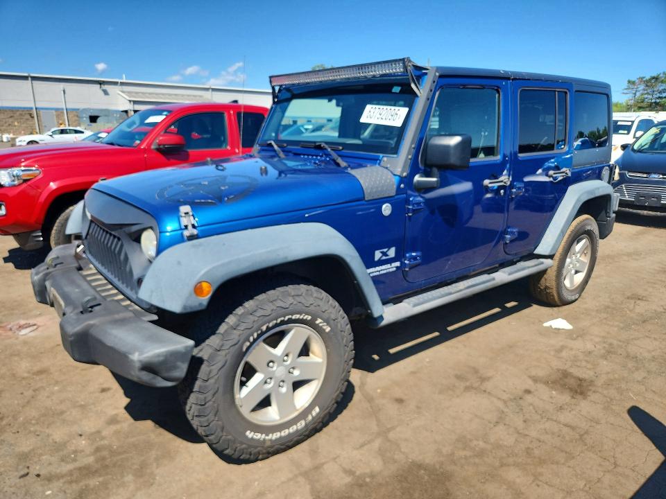 2009 Jeep Wrangler Unlimited მანქანა იყიდება აუქციონზე, vin: 1J8GA39159L729558, აუქციონის ნომერი: 63792096
