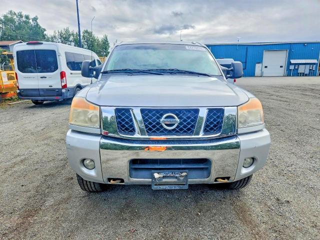 64476076 :رقم المزاد ، 1N6BA0EC5AN314477 vin ، 2010 Nissan Titan مزاد بيع