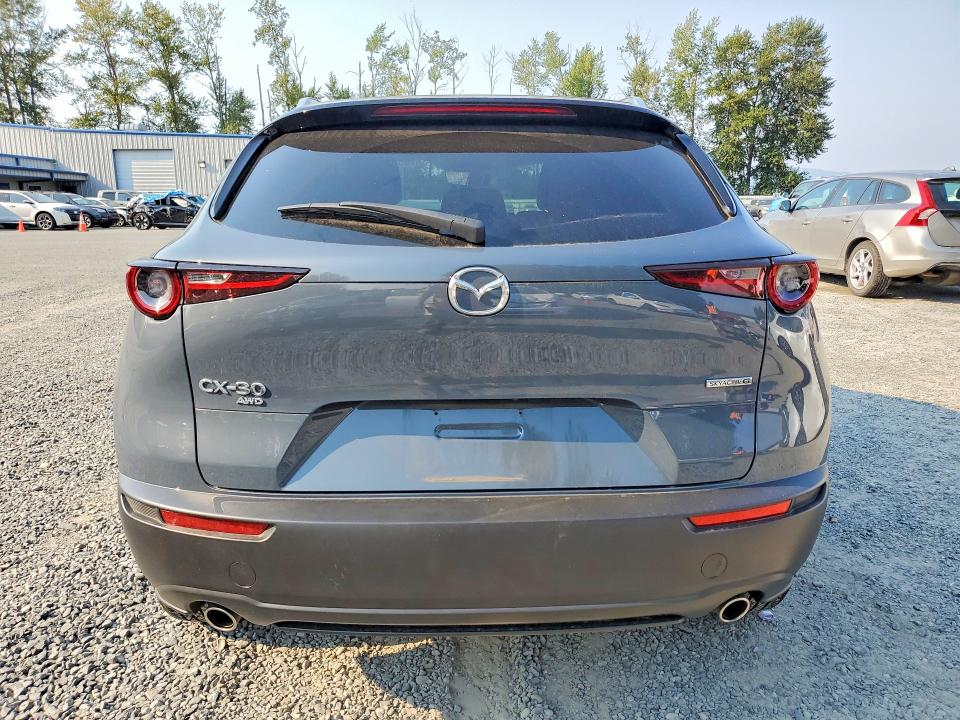 65214476 :رقم المزاد ، 3MVDMBCM4PM582674 vin ، 2023 Mazda Cx-30 مزاد بيع